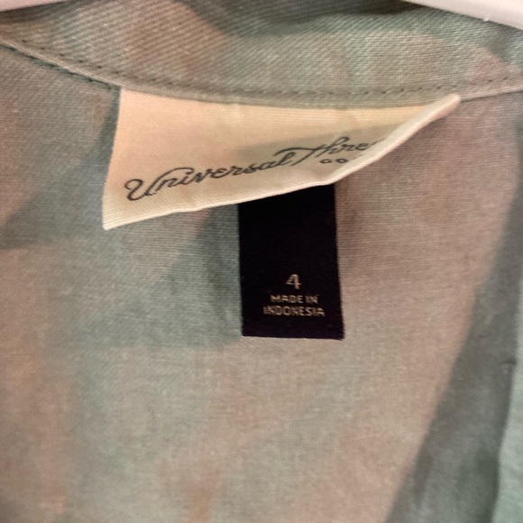 A eggshell jumpsuit - Picture 3 of 5